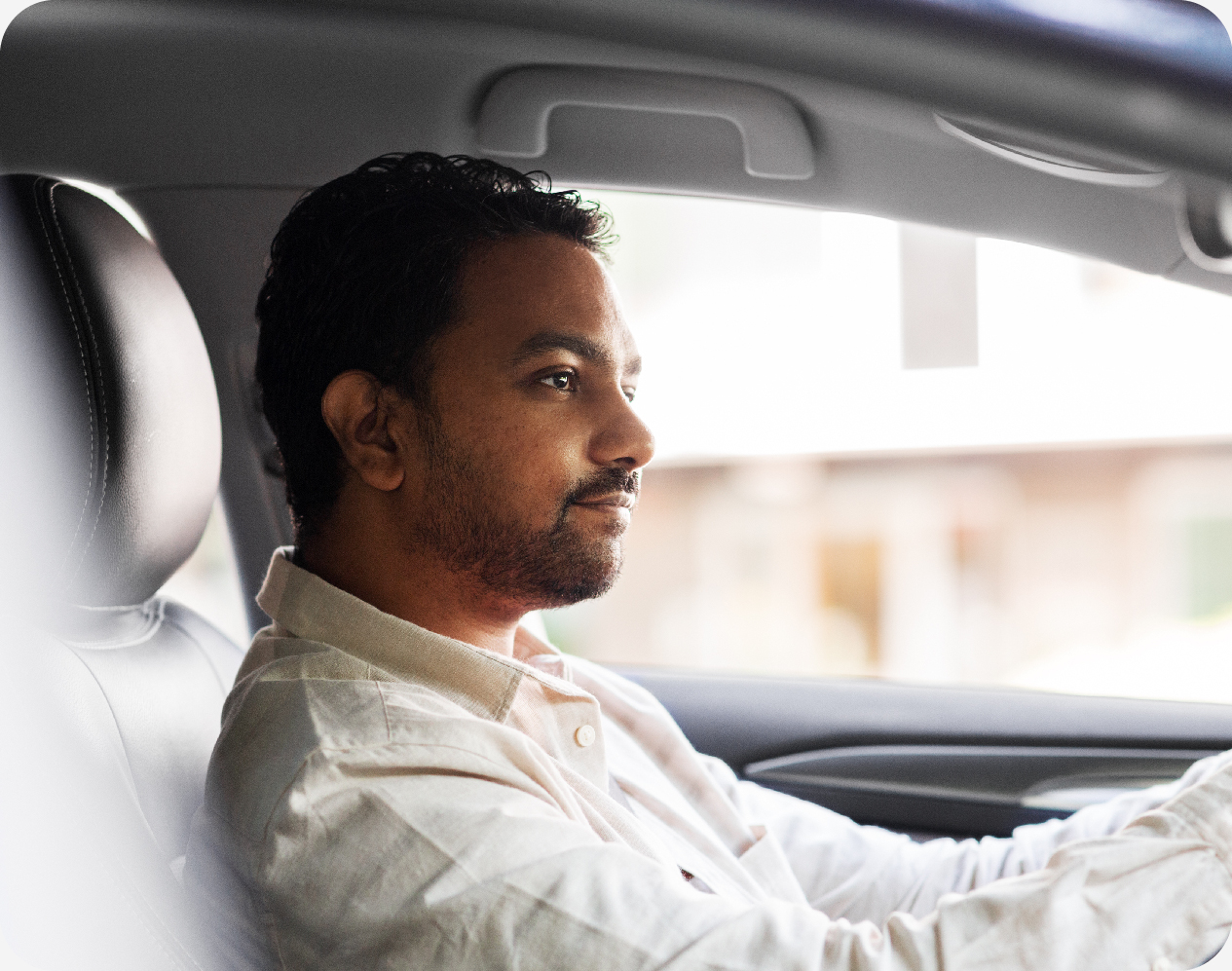 Chauffeur de taxis au volant de son véhicule