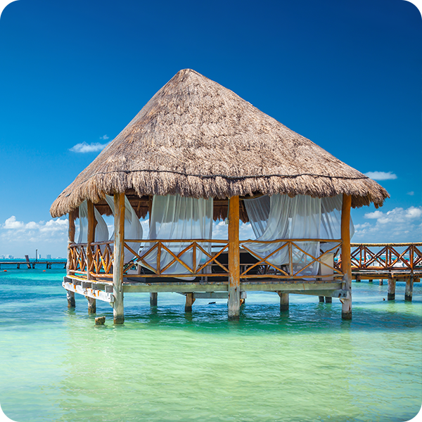 Wooden cabana on water